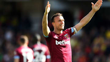 WATFORD, ENGLAND - MAY 12: Mark Noble of West Ham United thanks the travelling supporters, after scoring his second goal during the Premier League match between Watford FC and West Ham United at Vicarage Road on May 12, 2019 in Watford, United Kingdom. (Photo by Matthew Lewis/Getty Images)