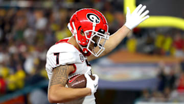 MIAMI GARDENS, FLORIDA - DECEMBER 31: Jermaine Burton #7 of the Georgia Bulldogs reacts after scoring a touchdown in the second quarter of the game against the Michigan Wolverines in the Capital One Orange Bowl for the College Football Playoff semifinal game at Hard Rock Stadium on December 31, 2021 in Miami Gardens, Florida. (Photo by Kevin C. Cox/Getty Images)
