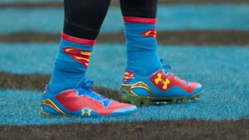 Dec 22, 2013; Charlotte, NC, USA; Carolina Panthers quarterback Cam Newton (1) wears Superman cleats prior to the start of the game against the New Orleans Saints at Bank of America Stadium. Mandatory Credit: Jeremy Brevard-USA TODAY Sports