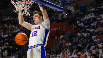 Florida Gators forward Colin Castleton (12) slam dunks the ball in the second half. The Kentucky Wildcats won 71-63 over the Florida Gators Saturday afternoon, March 5, 2022 at the Stephen C. O'Connell Center in Gainesville, FL. [Doug Engle/Ocala Star Banner]2022Gai Uf Kentucky Basketball