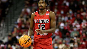MADISON, WISCONSIN - DECEMBER 29: Antonio Reeves #12 of the Illinois State Redbirds dribbles the basketball up court during the first half of the game against the Wisconsin Badgers at Kohl Center on December 29, 2021 in Madison, Wisconsin. Badgers defeated the Redbirds 89-85. (Photo by John Fisher/Getty Images)