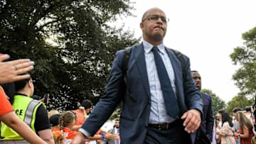 Clemson offensive coordinator Tony Elliott greets fans during Tiger Walk before the game with Clemson and Boston College in Clemson, S.C. Saturday, October 2, 2021.Ncaa Football Acc Clemson Boston College