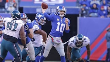 Jan 3, 2016; East Rutherford, NJ, USA; New York Giants quarterback Eli Manning (10) trows the ball during the second half against the Philadelphia Eagles at MetLife Stadium. The Eagles won 35-30. Mandatory Credit: Jim O