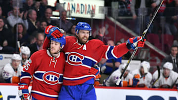 MONTREAL, QC - FEBRUARY 23: Shea Weber #6 and Andrew Shaw #65 of the Montreal Canadiens celebrate a goal against the New York Islanders in the NHL game at the Bell Centre on February 23, 2017 in Montreal, Quebec, Canada. (Photo by Francois Lacasse/NHLI via Getty Images) *** Local Caption ***