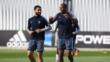 MOSCOW, RUSSIA - JULY 14: Djibril Sidibe of France speaks with Nabil Fekir of France during a France training session during the 2018 FIFA World Cup at Luzhniki Stadium on July 14, 2018 in Moscow, Russia. (Photo by Shaun Botterill/Getty Images)