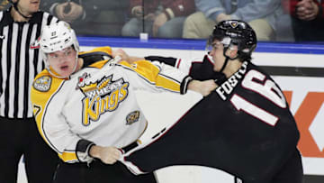 LANGLEY, BC - DECEMBER 2: Thomas Foster #16 of the Vancouver Giants fights Reid Duke #27 of the Brandon Wheat Kings during the third period of their WHL game at the Langley Events Centre on December 2, 2016 in Langley, British Columbia, Canada. (Photo by Ben Nelms/Getty Images)