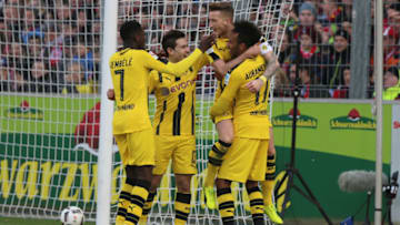FREIBURG, GERMANY - FEBRUARY 25: Pierre-Emerick Aubameyang (R) of Borussia Dortmund celebrates his 2nd goal with Marco Reus of Dortmund during the Bundesliga match between Sport Club Freiburg and Borussia Dortmund at Schwarzwald-Stadion on February 25, 2017 in Freiburg, Germany. (Photo by TF-Images/Getty Images)