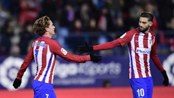 Atletico Madrid's French forward Antoine Griezmann (L) and Atletico Madrid's Belgian midfielder Yannick Ferreira Carrasco celebrate after scoring during the Spanish Copa del Rey (King's Cup) quarter final first leg football match Club Atletico de Madrid vs SD Eibar at the Vicente Calderon stadium in Madrid on January 19, 2017. / AFP / JAVIER SORIANO (Photo credit should read JAVIER SORIANO/AFP/Getty Images)