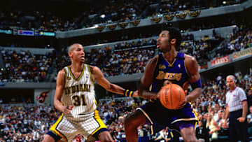INDIANAPOLIS, IN - JUNE 16: Reggie Miller #31 of the Indiana Pacers defends Kobe Bryant #8 of the Los Angeles Lakers during Game Five of the NBA Finals on June 16, 2000 at the Conseco Fieldhouse in Indianapolis, Indiana. NOTE TO USER: User expressly acknowledges and agrees that, by downloading and/or using this photograph, user is consenting to the terms and conditions of the Getty Images License Agreement. Mandatory Copyright Notice: Copyright 2000 NBAE (Photo by Andy Hayt/NBAE via Getty Images)