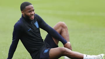 SAINT PETERSBURG, RUSSIA - JUNE 13: Raheem Sterling of England holds his ankle during a training session as part of the England media access at Spartak Zelenogorsk Stadium ahead of the FIFA World Cup 2018 on June 13, 2018 in Saint Petersburg, Russia. (Photo by Alex Morton/Getty Images)