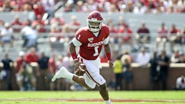NORMAN, OK - SEPTEMBER 28: Quarterback Jalen Hurts #1 of the Oklahoma Sooners scrambles against the Texas Tech Red Raiders at Gaylord Family Oklahoma Memorial Stadium on September 28, 2019 in Norman, Oklahoma. The Sooners defeated the Red Raiders 55-16. (Photo by Brett Deering/Getty Images)