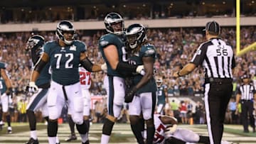 PHILADELPHIA, PA - SEPTEMBER 06: Lane Johnson #65 celebrates a two point conversion by Jay Ajayi #26 of the Philadelphia Eagles during the fourth quarter against the Atlanta Falcons at Lincoln Financial Field on September 6, 2018 in Philadelphia, Pennsylvania. (Photo by Mitchell Leff/Getty Images)