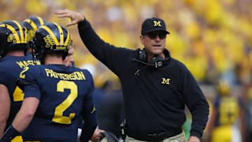 ANN ARBOR, MI - SEPTEMBER 22: Head coach Jim Harbaugh celebrates a first half score with Shea Patterson #2 while playing the Nebraska Cornhuskers on September 22, 2018 at Michigan Stadium in Ann Arbor, Michigan. (Photo by Gregory Shamus/Getty Images)