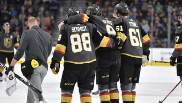 LAS VEGAS, NEVADA - JANUARY 04: Cody Glass #9 of the Vegas Golden Knights is helped off the ice after suffering an injury during the third period against the St. Louis Blues at T-Mobile Arena on January 04, 2020 in Las Vegas, Nevada. (Photo by Jeff Bottari/NHLI via Getty Images)