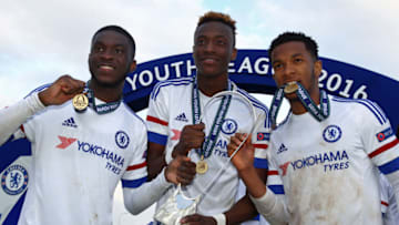 NYON, SWITZERLAND - APRIL 18: Fikayo Tomori, Tammy Abraham and Kasey Palmer of Chelsea FC (L-R) celebrate with the UEFA Youth League trophy after the UEFA Youth League Final match between Paris Saint Germain and Chelsea FC at Colovray Stadion on April 18, 2016 in Nyon, Switzerland. (Photo by Philipp Schmidli/Getty Images)