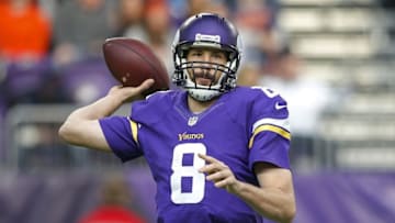 Jan 1, 2017; Minneapolis, MN, USA; Minnesota Vikings quarterback Sam Bradford (8) passes against the Chicago Bears in the second quarter at U.S. Bank Stadium. The Vikings win 38-10. Mandatory Credit: Bruce Kluckhohn-USA TODAY Sports