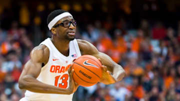 SYRACUSE, NY - DECEMBER 15: Paschal Chukwu #13 of the Syracuse Orange passes the ball during the second half against the Old Dominion Monarchs at the Carrier Dome on December 15, 2018 in Syracuse, New York. Old Dominion defeats Syracuse 68-62. (Photo by Brett Carlsen/Getty Images)