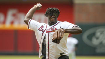 Apr 13, 2022; Atlanta, Georgia, USA; Former Georgia Bulldogs defensive tackle Jordan Davis (99) throws out the first pitch before a game between the Atlanta Braves and Washington Nationals at Truist Park. Mandatory Credit: Brett Davis-USA TODAY Sports
