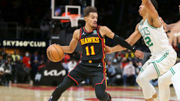 Nov 17, 2021; Atlanta, Georgia, USA; Atlanta Hawks guard Trae Young (11) is defended by Boston Celtics forward Grant Williams (12) in the first quarter at State Farm Arena. Mandatory Credit: Brett Davis-USA TODAY Sports