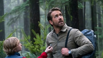 THE ADAM PROJECT - (L to R) Walker Scobell as Young Adam and Ryan Reynolds as Big Adam. Cr. Doane Gregory/Netflix © 2022