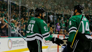 DALLAS, TX - OCTOBER 06: Dallas Stars center Tyler Seguin (91) celebrates scoring a goal with left wing Jamie Benn (14) during the game between the Dallas Stars and the Winnipeg Jets on October 6, 2018 at the American Airlines Center in Dallas, Texas. Dallas defeats Winnipeg 5-1. (Photo by Matthew Pearce/Icon Sportswire via Getty Images)
