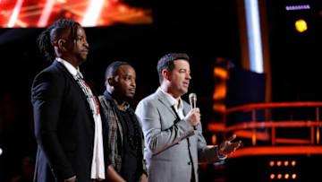 THE VOICE -- "Live Top 12" Episode 1415B -- Pictured: (l-r) D.R. King, Rayshun Lamarr, Carson Daly -- (Photo by: Trae Patton/NBC)