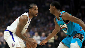 LOS ANGELES, CALIFORNIA - FEBRUARY 24: Kawhi Leonard #2 of the Los Angeles Clippers dribbles into the defense of Josh Jackson #20 of the Memphis Grizzlies during the first half of a game at Staples Center on February 24, 2020 in Los Angeles, California. NOTE TO USER: User expressly acknowledges and agrees that, by downloading and/or using this photograph, user is consenting to the terms and conditions of the Getty Images License Agreement. (Photo by Sean M. Haffey/Getty Images)