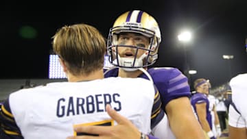SEATTLE, WASHINGTON - SEPTEMBER 07: Chase Garbers #7 of the California Golden Bears and Jacob Eason #10 of the Washington Huskies hug after the California Golden Bears defeated the Washington Huskies 20-19 during their game at Husky Stadium on September 07, 2019 in Seattle, Washington. (Photo by Abbie Parr/Getty Images)