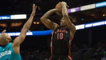 Apr 8, 2015; Charlotte, NC, USA; Toronto Raptors guard DeMar DeRozan (10) shoots the ball over Charlotte Hornets guard Gerald Henderson (9) during the first half at Time Warner Cable Arena. Mandatory Credit: Jeremy Brevard-USA TODAY Sports