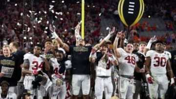 Jan 11, 2016; Glendale, AZ, USA; Alabama Crimson Tide players celebrate after the game against the Clemson Tigers in the 2016 CFP National Championship at University of Phoenix Stadium. Alabama won 45-40. Mandatory Credit: Matthew Emmons-USA TODAY Sports