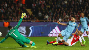 MONACO - MARCH 15: Danijel Subasic of AS Monaco (1) makes a save from Sergio Aguero of Manchester City as Fabinho of AS Monaco challenges during the UEFA Champions League Round of 16 second leg match between AS Monaco and Manchester City FC at Stade Louis II on March 15, 2017 in Monaco, Monaco. (Photo by Michael Steele/Getty Images)