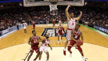 COLUMBIA, SOUTH CAROLINA - MARCH 22: Aaron Calixte #2 of the Oklahoma Sooners drives to the basket against KJ Buffen #14 of the Mississippi Rebels in the first half during the first round of the 2019 NCAA Men's Basketball Tournament at Colonial Life Arena on March 22, 2019 in Columbia, South Carolina. (Photo by Kevin C. Cox/Getty Images)
