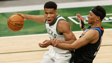 Giannis Antetokounmpo (34) drives for the basket as OKC Thunder forward Darius Bazley (7) : Jeff Hanisch-USA TODAY Sports