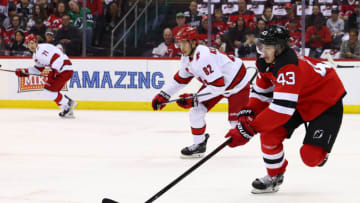 May 7, 2023; Newark, New Jersey, USA; New Jersey Devils defenseman Luke Hughes (43) skates with the puck against the Carolina Hurricanes during the first period in game three of the second round of the 2023 Stanley Cup Playoffs at Prudential Center. Mandatory Credit: Ed Mulholland-USA TODAY Sports