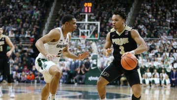 EAST LANSING, MI - FEBRUARY 10: Carsen Edwards #3 of the Purdue Boilermakers handles the ball while defended by Miles Bridges #22 of the Michigan State Spartans in the second half at Breslin Center on February 10, 2018 in East Lansing, Michigan. (Photo by Rey Del Rio/Getty Images)