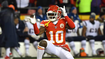 KANSAS CITY, MISSOURI - JANUARY 20: Tyreek Hill #10 of the Kansas City Chiefs reacts after a catch in the second quarter against the New England Patriots during the AFC Championship Game at Arrowhead Stadium on January 20, 2019 in Kansas City, Missouri. (Photo by Peter Aiken/Getty Images)