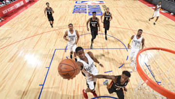 LAS VEGAS, NV - JULY 11: Edmond Sumner #5 of the Indiana Pacers shoots the ball against the Atlanta Hawks during the 2018 Las Vegas Summer League on July 11, 2018 at the Thomas & Mack Center in Las Vegas, Nevada. NOTE TO USER: User expressly acknowledges and agrees that, by downloading and or using this Photograph, user is consenting to the terms and conditions of the Getty Images License Agreement. Mandatory Copyright Notice: Copyright 2018 NBAE (Photo by Garrett Ellwood/NBAE via Getty Images)