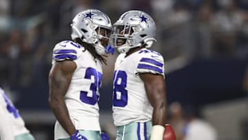 ARLINGTON, TEXAS - AUGUST 24: Joe Thomas #48 of the Dallas Cowboys celebrates his touchdown on a blocked punt with Kavon Frazier #35 in the first quarter during a NFL preseason game against the Houston Texans at AT&T Stadium on August 24, 2019 in Arlington, Texas. (Photo by Ronald Martinez/Getty Images)