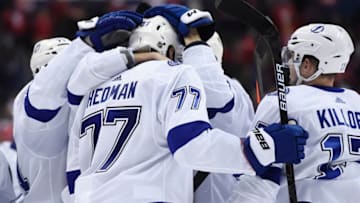 WASHINGTON, DC - MARCH 20: Victor Hedman #77 of the Tampa Bay Lightning celebrates with his teammates after scoring the game winning goal in overtime against the Washington Capitals at Capital One Arena on March 20, 2019 in Washington, DC. (Photo by Patrick McDermott/NHLI via Getty Images)