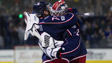 COLUMBUS, OH - MARCH 07: Columbus Blue Jackets Winger Nick Foligno (71) hugs Columbus Blue Jackets Goalie Sergei Bobrovsky (72) after a regular season game between the Columbus Blue Jackets and New Jersey Devils at Nationwide Arena in Columbus, OH. The Columbus Blue Jackets won 2-0 over the New Jersey Devils. (Photo by Michael Griggs/Icon Sportswire via Getty Images)