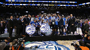 NEW YORK, NY - MARCH 11: The Duke Blue Devils hold up the trophy after defeating the Notre Dame Fighting Irish 75-69 in the championship game of the 2017 Men's ACC Basketball Tournament at the Barclays Center on March 11, 2017 in New York City. (Photo by Al Bello/Getty Images)