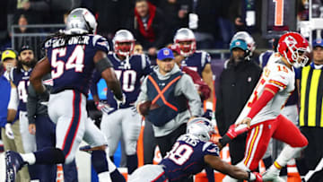 FOXBOROUGH, MA - OCTOBER 14: Patrick Mahomes #15 of the Kansas City Chiefs is tackled by Trey Flowers #98 of the New England Patriots in the second quarter of a game at Gillette Stadium on October 14, 2018 in Foxborough, Massachusetts. (Photo by Adam Glanzman/Getty Images)