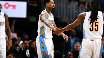 DENVER, CO - MARCH 22: Wilson Chandler #21 and Kenneth Faried #35 of the Denver Nuggets high five each other during the game against the Cleveland Cavaliers on March 22, 2017 at the Pepsi Center in Denver, Colorado. NOTE TO USER: User expressly acknowledges and agrees that, by downloading and/or using this Photograph, user is consenting to the terms and conditions of the Getty Images License Agreement. Mandatory Copyright Notice: Copyright 2017 NBAE (Photo by Garrett Ellwood/NBAE via Getty Images)