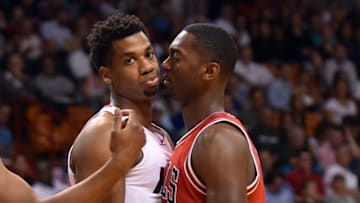 Apr 7, 2016; Miami, FL, USA; Chicago Bulls forward Bobby Portis (5) exchanges words with Miami Heat center Hassan Whiteside (21) during the first half at American Airlines Arena. Mandatory Credit: Steve Mitchell-USA TODAY Sports
