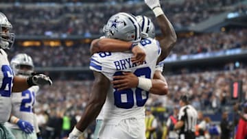 Nov 20, 2016; Arlington, TX, USA; Dallas Cowboys quarterback Dak Prescott (4) celebrates his third quarter touchdown pass with receiver Dez Bryant (88) against the Baltimore Ravens at AT&T Stadium. Mandatory Credit: Matthew Emmons-USA TODAY Sports