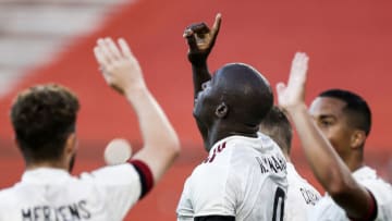 Belgium's forward Romelu Lukaku (C) celebrates scoring his team's first goal during the international friendly football match between Belgium and Croatia at the King Baudouin Stadium in Brussels on June 6, 2021, ahead of the EURO 2020/2021 tournament. (Photo by Kenzo TRIBOUILLARD / AFP) (Photo by KENZO TRIBOUILLARD/AFP via Getty Images)