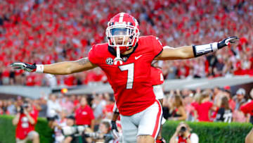 ATHENS, GA - SEPTEMBER 18: Jermaine Burton #7 of the Georgia Bulldogs reacts after scoring a touchdown during the first half against the South Carolina Gamecocks at Sanford Stadium on September 18, 2021 in Athens, Georgia. (Photo by Todd Kirkland/Getty Images)