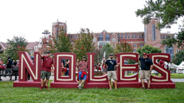 TALLAHASSEE, FL - SEPTEMBER 3: Florida State Seminoles fans pose in front of a NOLES sign before hosting the Virginia Tech Hokies at Doak Campbell Stadium on September 3, 2018 in Tallahassee, Florida. (Photo by Don Juan Moore/Getty Images)