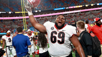 CHARLOTTE, NORTH CAROLINA - SEPTEMBER 04: Jamaree Salyer #69 of the Georgia Bulldogs celebrates after their win against the Clemson Tigers in the Duke's Mayo Classic at Bank of America Stadium on September 04, 2021 in Charlotte, North Carolina. (Photo by Grant Halverson/Getty Images)