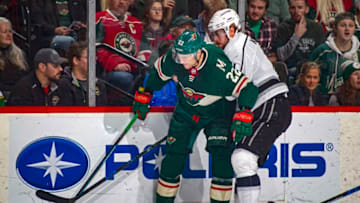 ST. PAUL, MN - OCTOBER 25: Nino Niederreiter #22 of the Minnesota Wild and Anze Kopitar #11 of the Los Angeles Kings battle during a game between the Minnesota Wild and Los Angeles Kings at Xcel Energy Center on October 25, 2018 in St. Paul, Minnesota. The Wild defeated the Kings 4-1.(Photo by Bruce Kluckhohn/NHLI via Getty Images)